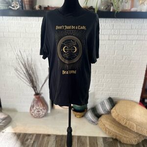 Nike Black and Gold Short Sleeve Tee with Graphic Design